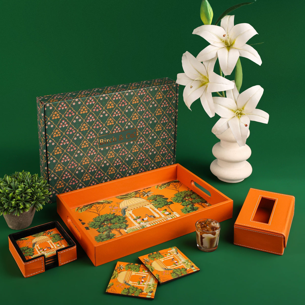 Assorted Birch & Co. gift hampers and printed gift boxes styled for festive gifting